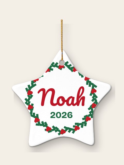 Ceramic star ornament with a wreath and the name Noah