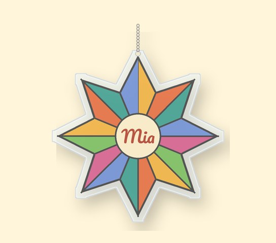 Star-shaped suncatcher with colored panels and the name Mia